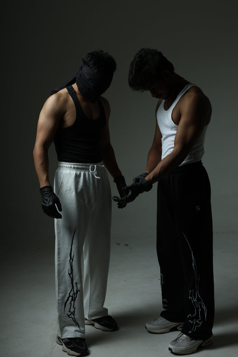 THE CARNAGE COMFORT BAGGY TRACK PANTS