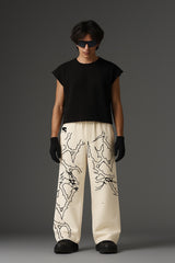 THE LOCKED IN COMFORT BAGGY TRACK PANTS
