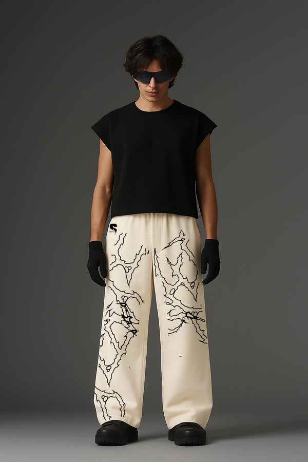 THE LOCKED IN COMFORT BAGGY TRACK PANTS