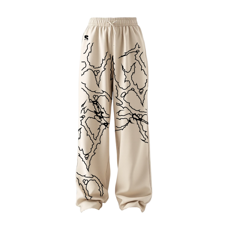 THE LOCKED IN COMFORT BAGGY TRACK PANTS